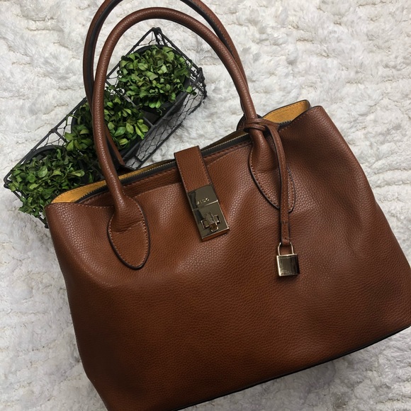 Aldo Handbags - NWOT ALDO large brown purse with front clasp
